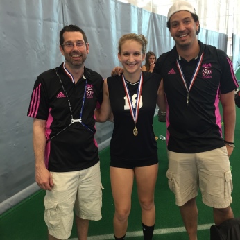 KAITLIN WITH HER VOLLEYBALL COACHES AFTER WINNING A MEDAL.